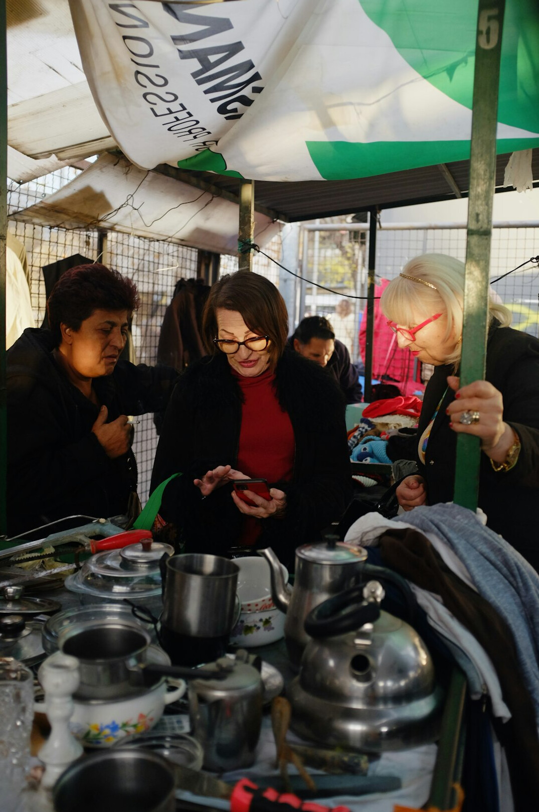 Small team of journalists discussing around a table