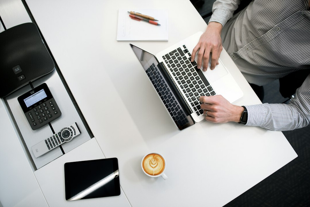 person checking facts on laptop